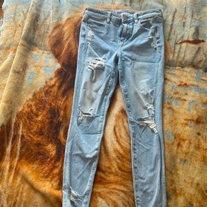 American Eagle blue ripped skinny jeans